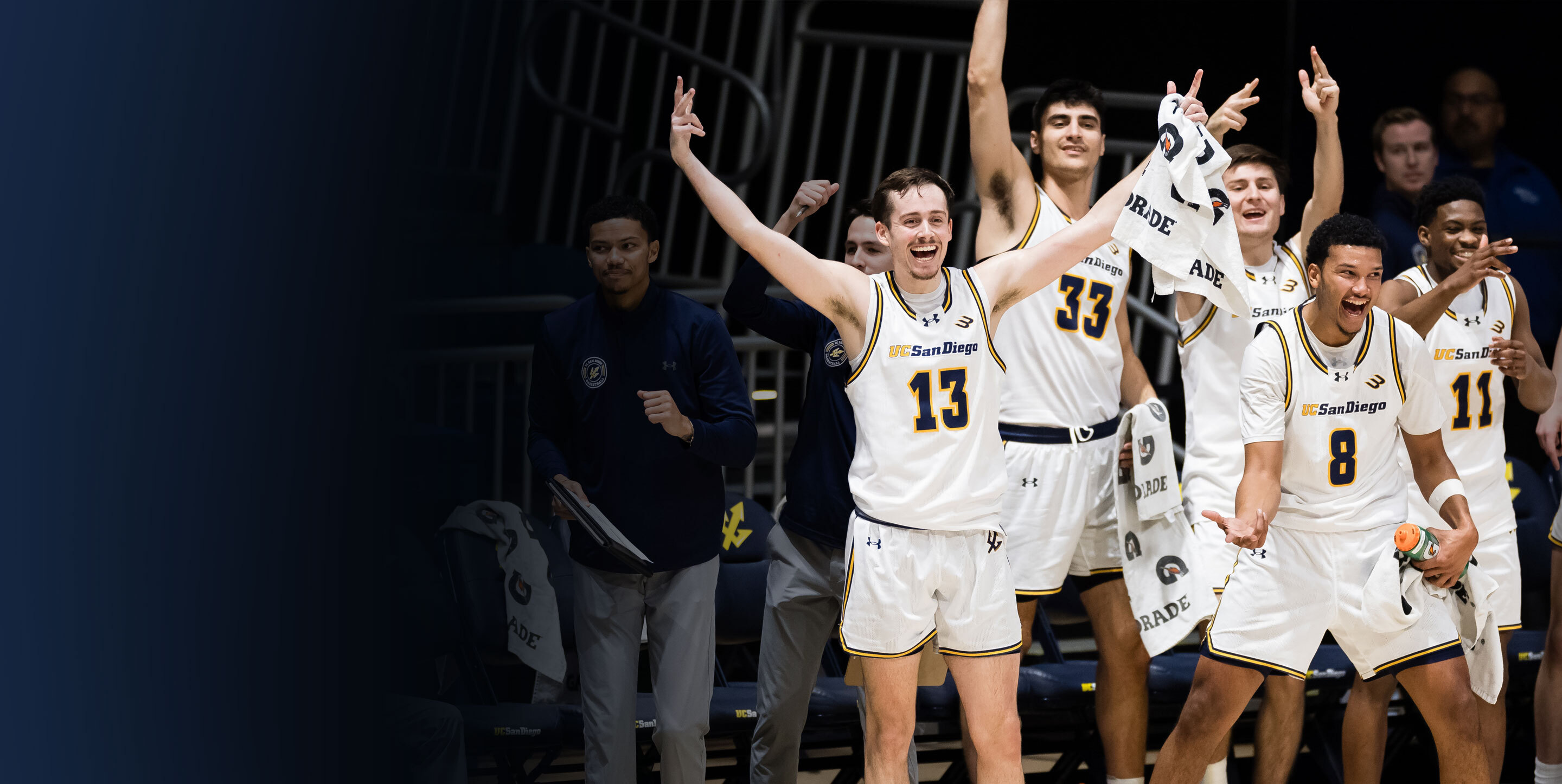 Triton men's basketball players celebrate win